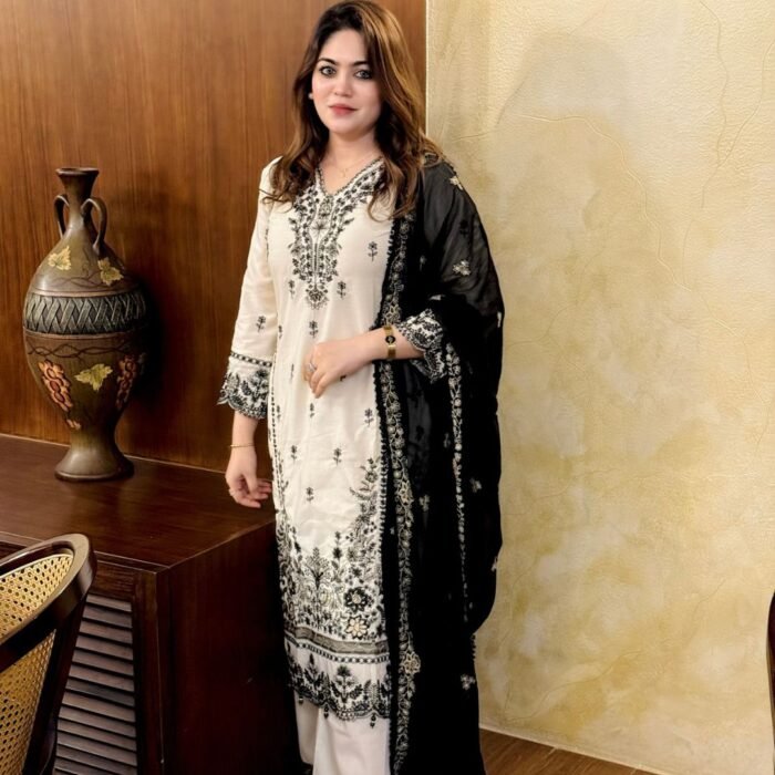 *"Elegance in every stitch: Embroidered 3-piece dress. Exquisite embroidery & sequin work."* - Image 2